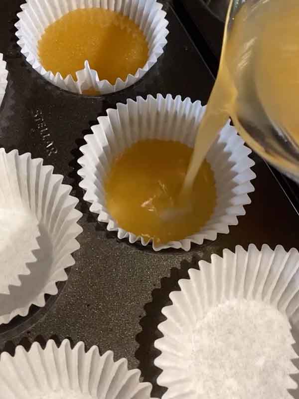 pour the chicken bone broth into individual portions