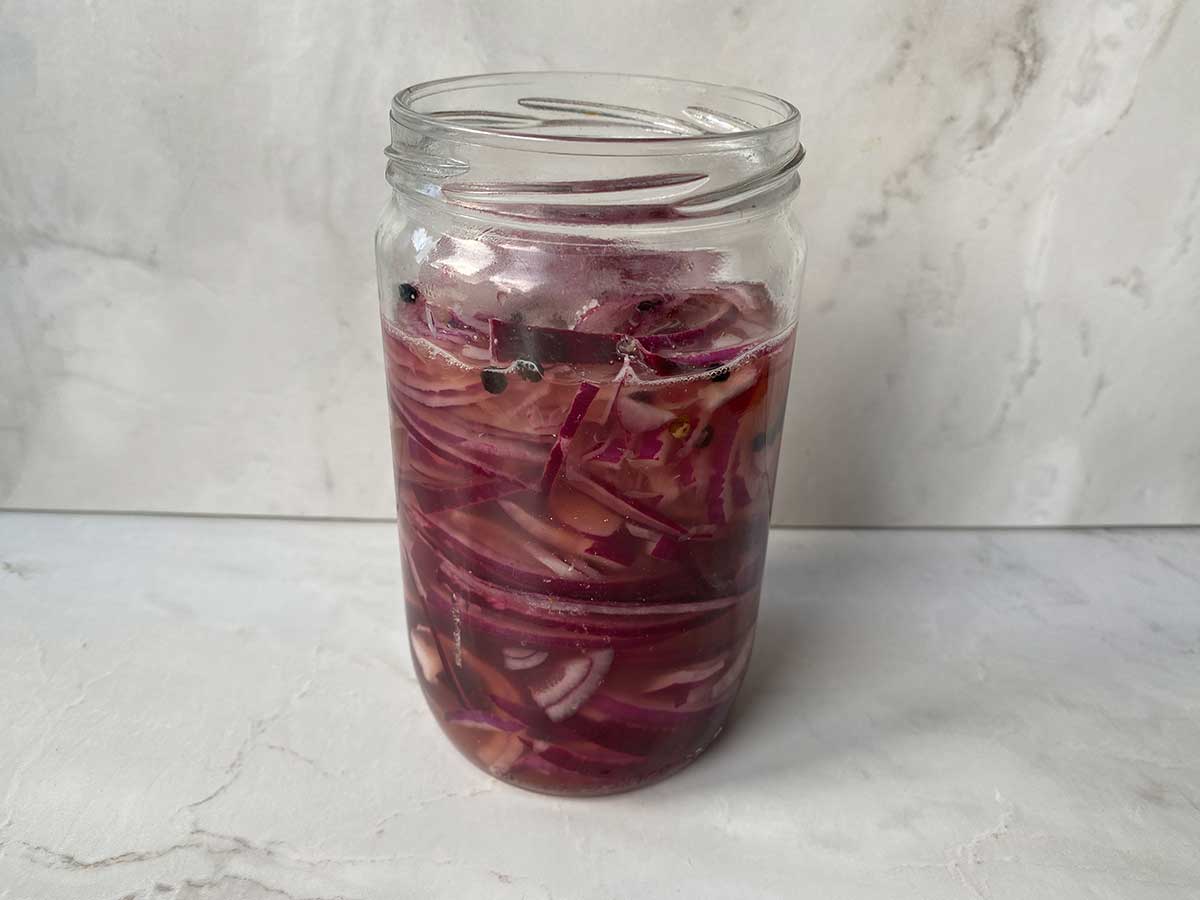 Step 4 Pour the hot pickling brine over the onions