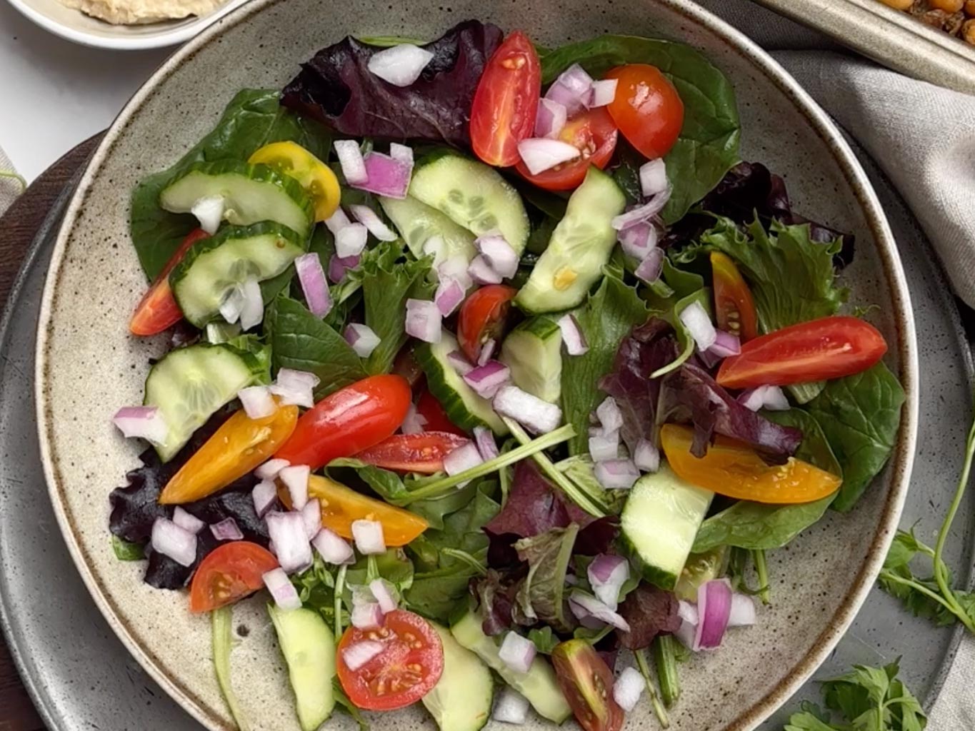While the chickpeas bake, prepare your salad base