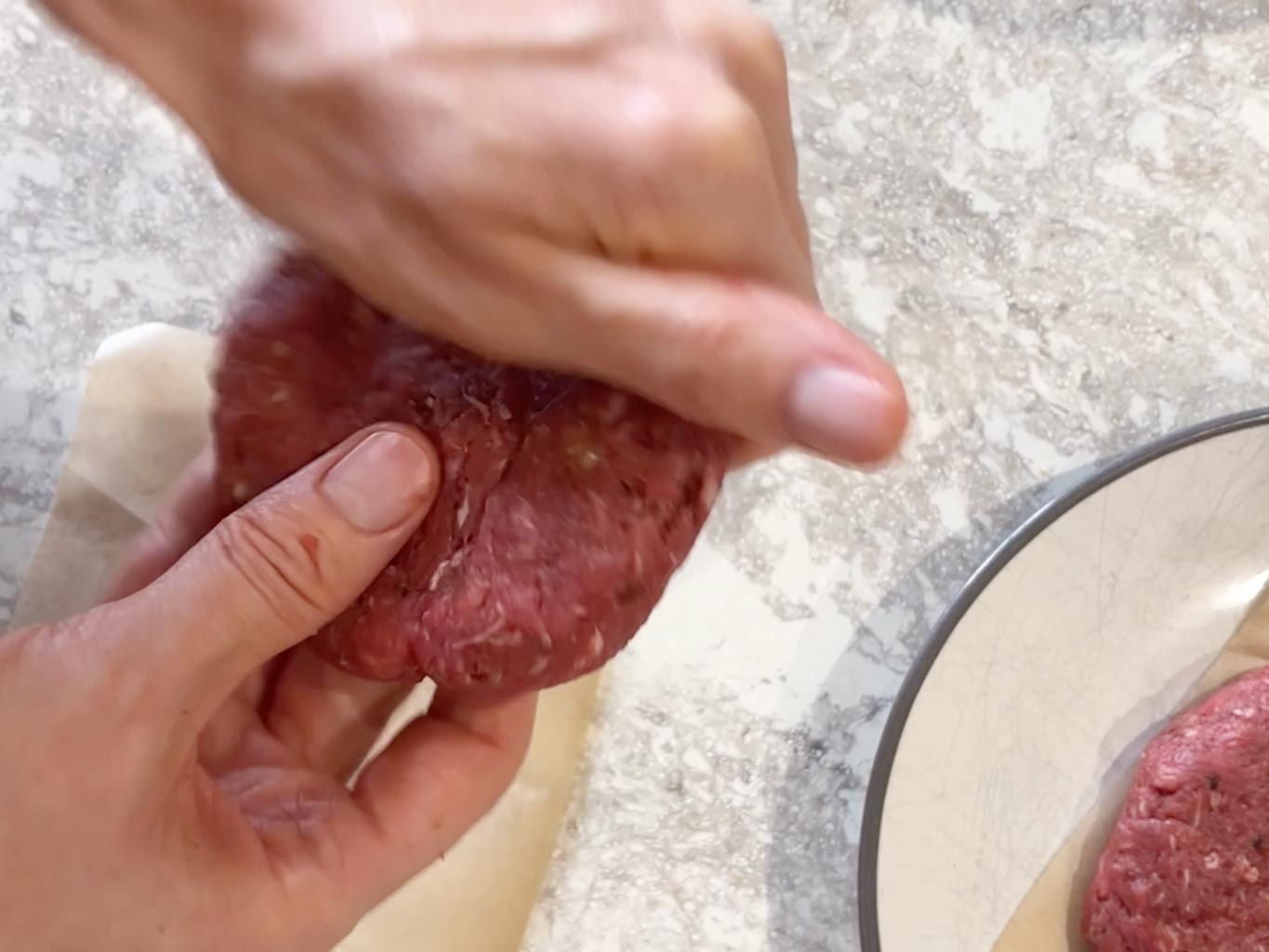 Step 3 - Shape the beef mixture into round flat patties using your hands or a burger press