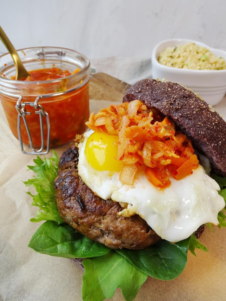Kimchi egg and beef burgers with soft gluten free burger buns